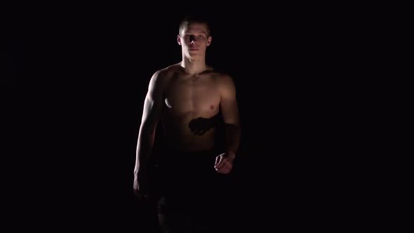 Muscular Guy Walks. Black alt
