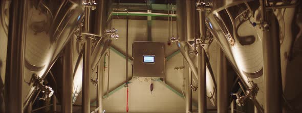 Big brewery vats in a factory alt
