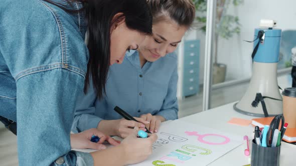 Slow Motion of Ambitious Feminists Drawing Posters for Equal Gender Rights Protest alt