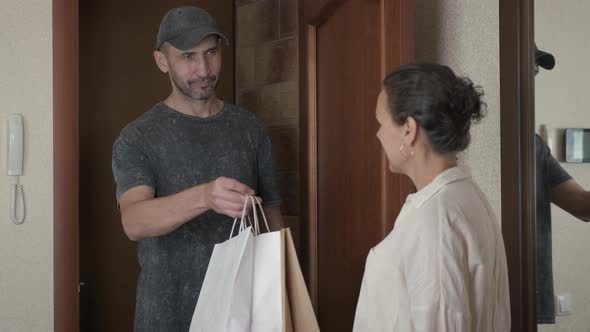Man Gives a Delivery Order. alt