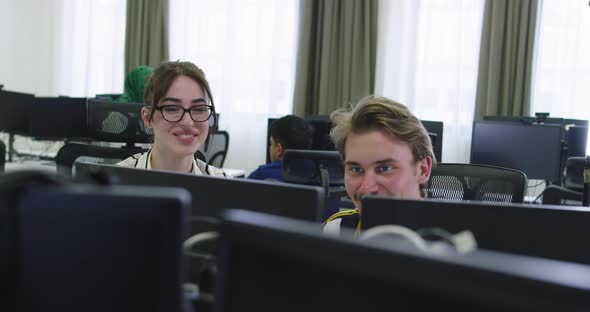 Concentrated Male Businessman Looking at Computer Monitor Working at Startup Office alt