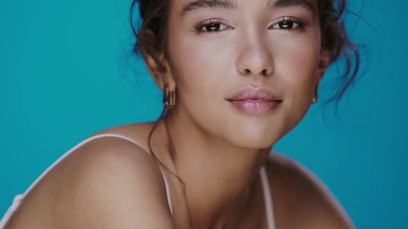 Cute Girl with Light Make-up Looking To Camera and Laughing with Perfect Smile and Bright White alt