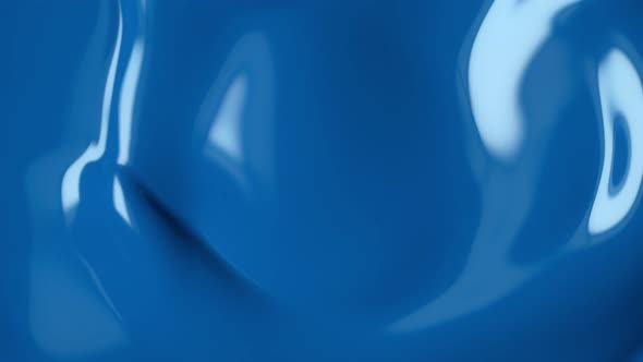 Super Slow Motion Shot of Swirling Blue Fluid Background at 1000Fps. alt