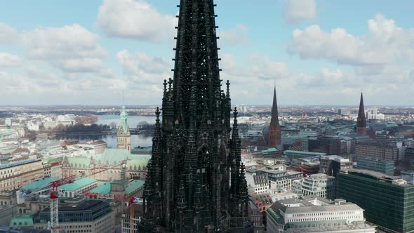 Aerial Close Up View of Dark Charred Spire of St alt