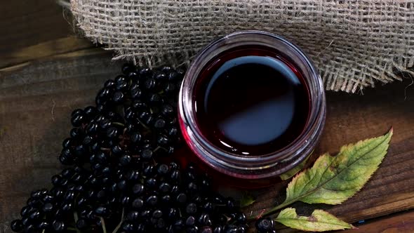 Black Elderberry On A Wooden Background. Herbal Medicine. Homeopathy, Black Berry