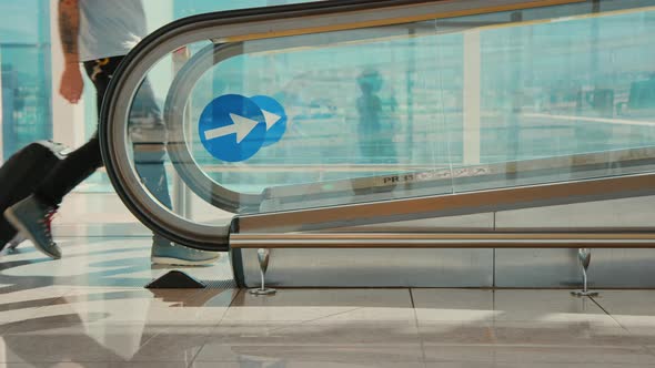 Modern Traveler in Big Empty Airport Goes To Gate alt