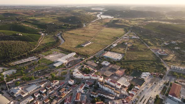 Panoramic view green fields surrounding Silves, Algarve. Beautiful sunset light alt