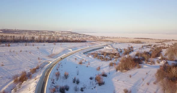 Car On Winter Town Road