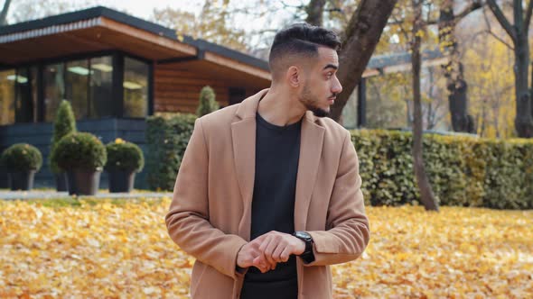 Handsome Young Guy Wait Looking at Watch Outdoors Attractive Woman Coming on Date Friendly Meeting alt