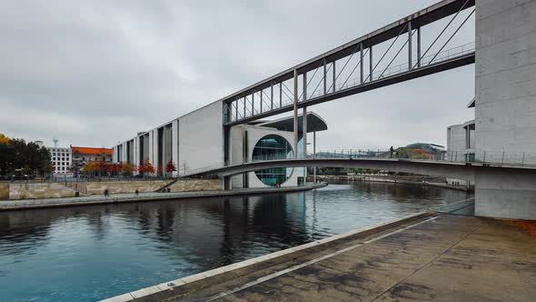 Cloudy Time Lapse of parliament building in Autumn with spree river, Berlin, Germany alt