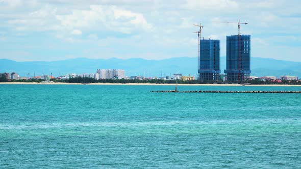 Skyscrapers under construction Phan Rang City waterfront, Vietnam. Static view alt
