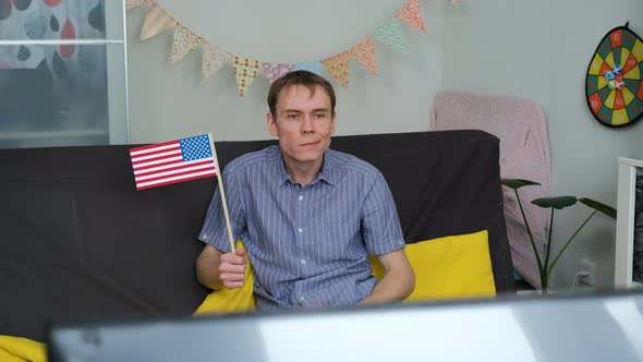 Man Eating Popcorn While Watching Sports on TV alt