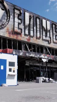Vertical Video of a Burnt Shopping Center During the War in Bucha Ukraine alt