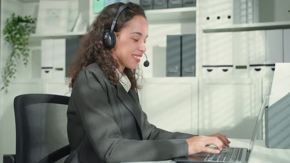 Portrait of Latino beautiful business woman smile while work in office. alt
