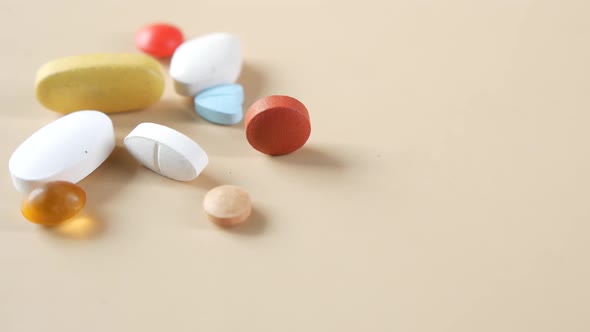 Close Up of Many Colorful Pills and Capsules alt
