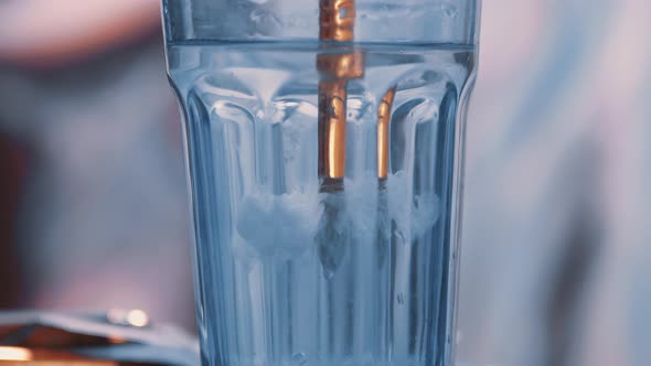 Paintbrush Dipping in Water alt