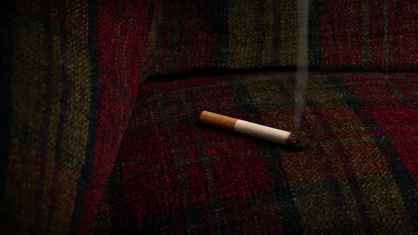 Cigarette Burning Sofa - Fire Hazard Concept alt