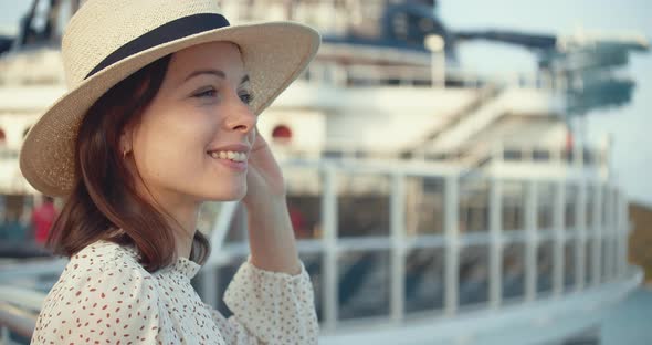 Smiling woman on a ship. Shot on Black Magic Camera alt