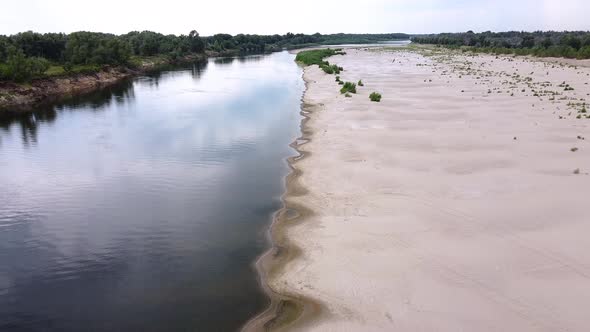 A beautiful river with a sandy coast