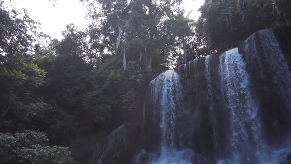 Scenic Nature of Beautiful Waterfall and Emerald Pool of Fresh Water Lake in Wild Jungle Forest alt