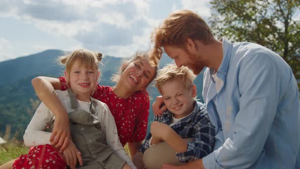 Cheerful Family Feeling Happy on Nature Close Up alt
