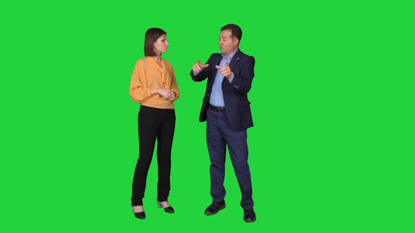 Man and woman working on architectural project. alt