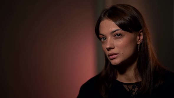 Sceptic Woman Is Listening To Someone and Grimacing alt