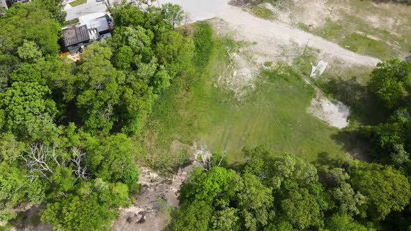 Aerial track through a razed area that use to be Bluffton School in Muskegon. alt