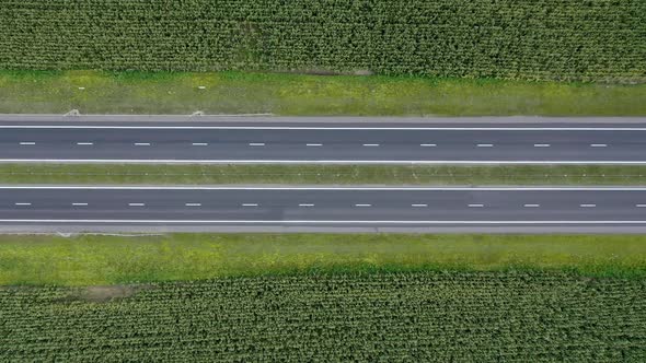 Aerial Flying Over An Empty Suburban Speed Highway During The Quarantine alt