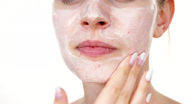 Woman Apply Mask Cream on Face