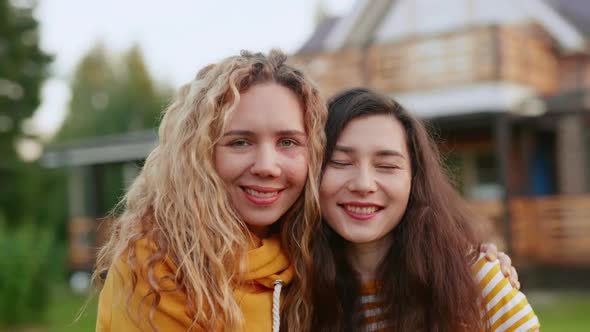 Victim of Domestic Violence Broke Her Abusive Relationship. Portrait of Two Happy Women in Love alt