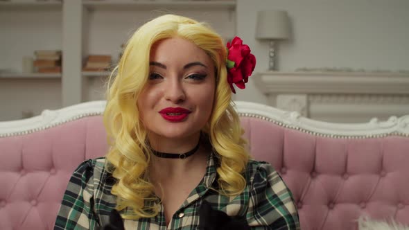 Graceful Lovely Female in Cosplay Costume Making Dance Moves Indoors alt