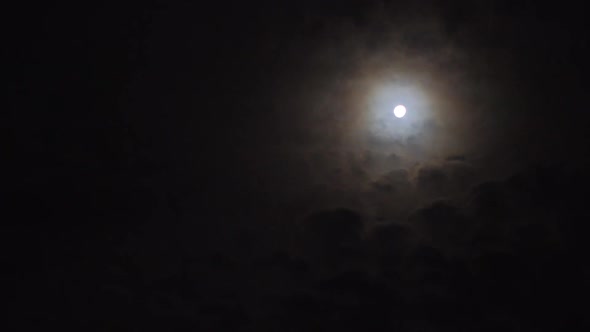 Real Time Video of Beautiful Night Sky with Full Moon and Clouds
