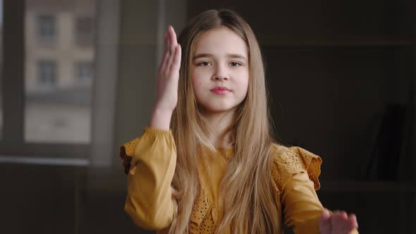 Closeup Headshot Female Portrait Indoors Disappointed Girl Teenager Schoolgirl Student Pupil Waving alt