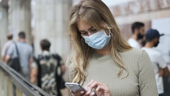 Passenger Metro Mask Typing Message Phone Coronavirus. Woman Use Mobile Covid-19 alt