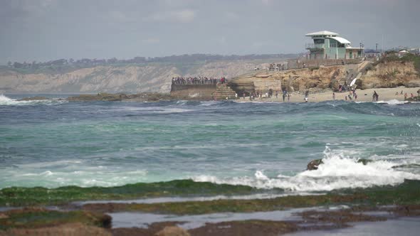 Waves crashing into rocks alt