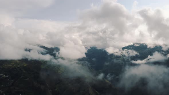Flying over of the clouds in the Andes Mountains in Peru 4K