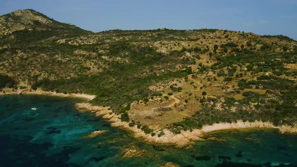 Aerial, Beautiful Seascape In Sardinia, Italy, Turquoise Water And Little Boat