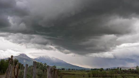 Dramatic storm moving through Utah Valley looking towards Nebo Mountain alt