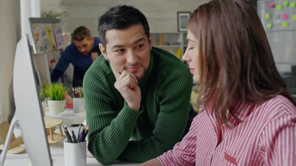 Friendly Colleagues Having a Chat alt