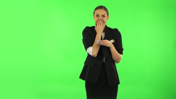 Girl Opens a Small Box with a Surprise and Is Very Disappointed with What She Saw. Green Screen alt