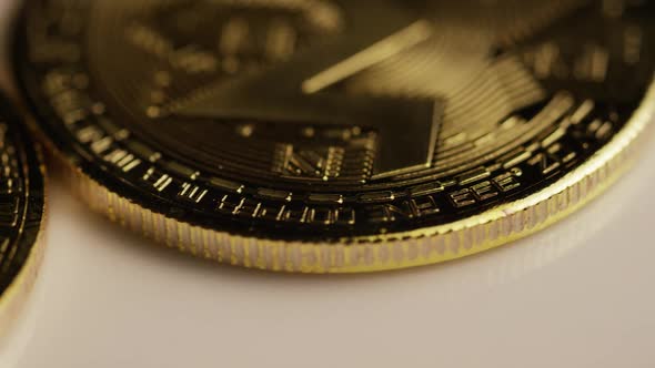 Rotating shot of Bitcoins (digital cryptocurrency) - BITCOIN MONERO  alt