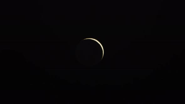 Still Video of Thin Moon Slowly Moving in Dark Night Sky Dark Sky Background alt
