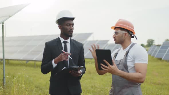 Shaking Hands Among Solar Plant alt