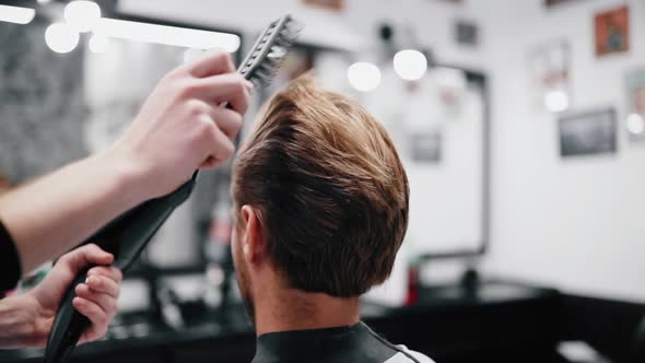 Drying and Styling of Men's Hair. Slow Motion alt
