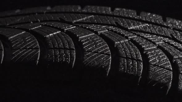 Wet Tire Sparkles With Drops