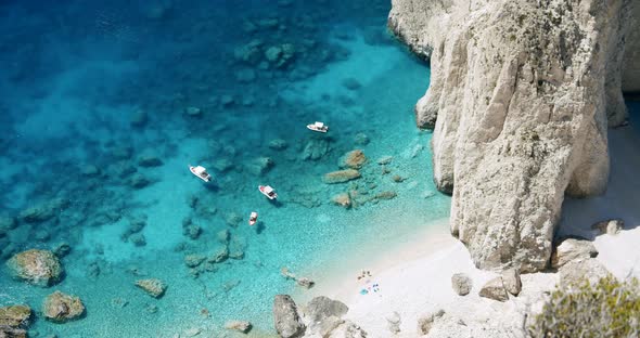 White Rock Near Keri Blue Lagoon with Tourist Pleasure Boats alt