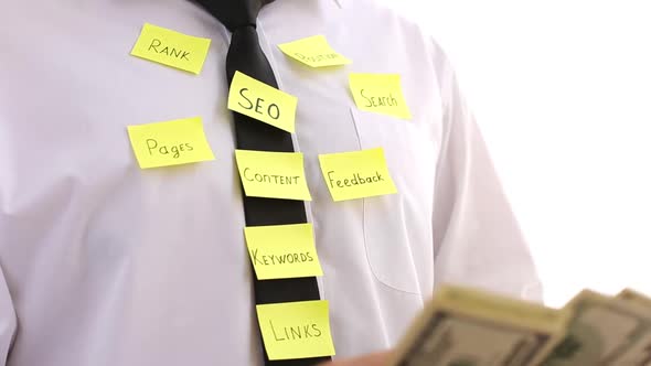 Seo Optimization, Notes On The Employees Tie And White Shirt. Counts Money