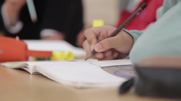 A Child Writing Something