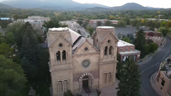 Rotating upper drone view of The Cathedral Bascilia of St. Francis of Assisi in Santa Fe, New Mexico alt